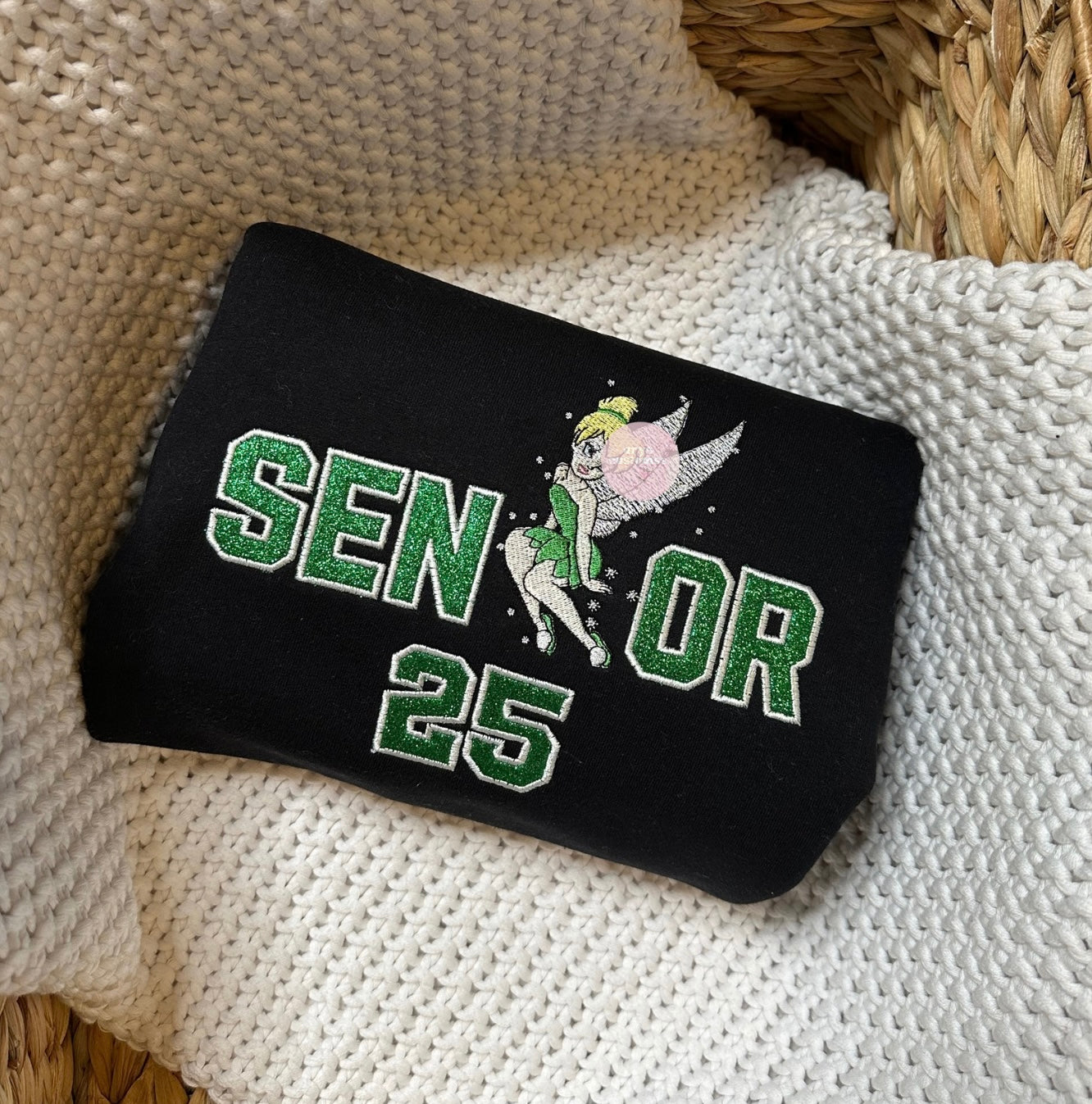 Senior fairy sitting